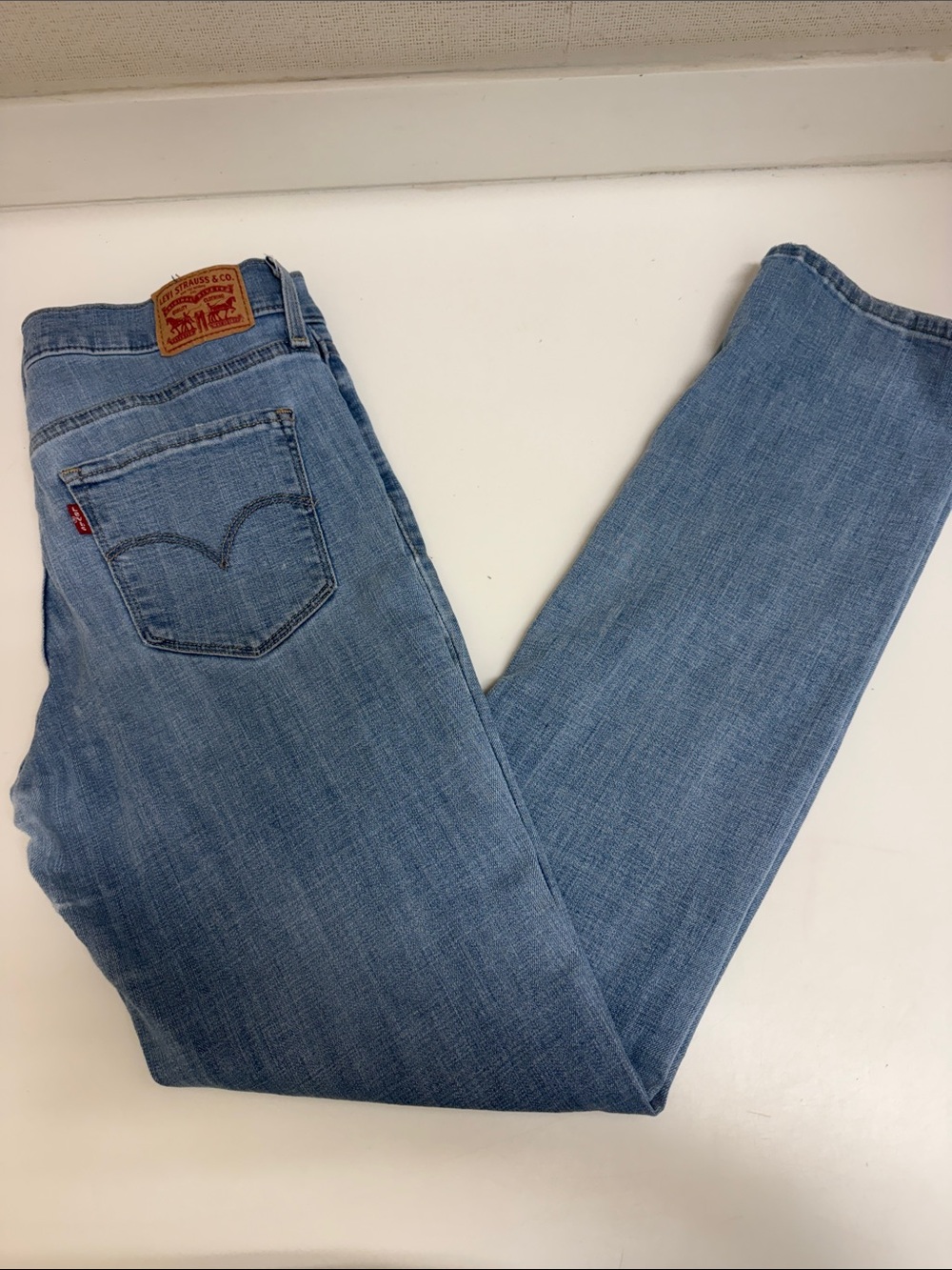 Levi's Women's 314 Shaping Straight Jeans in Light Blue Denim